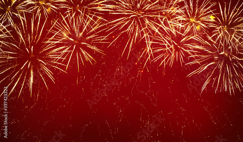 Red background of glitter lights and fireworks