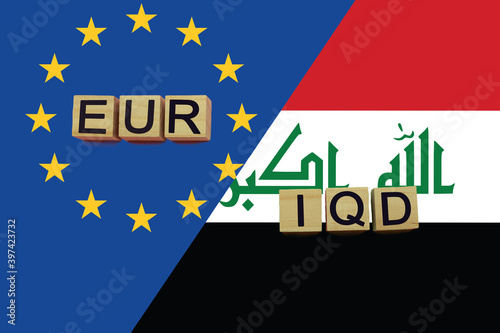 United Europe and Iraq currencies codes on national flags background photo