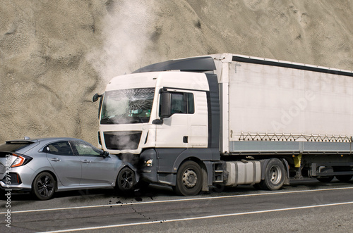 Fotografie Frontal collision - accident - between a truck and a car