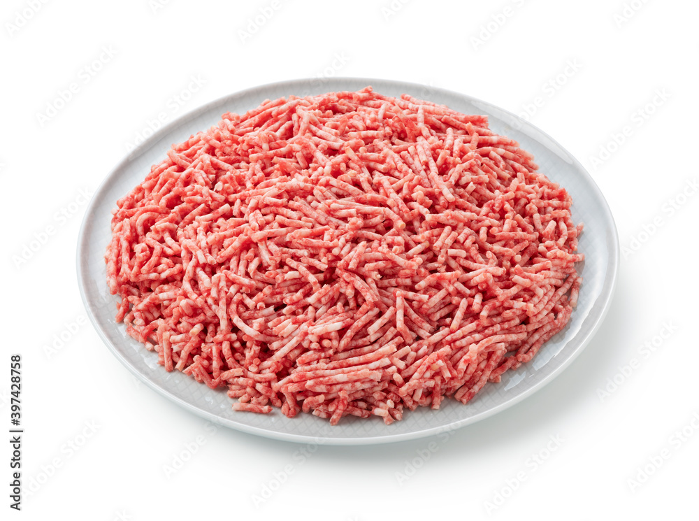 Minced meat served on a plate on a white background Minced meat served on a plate on a white background