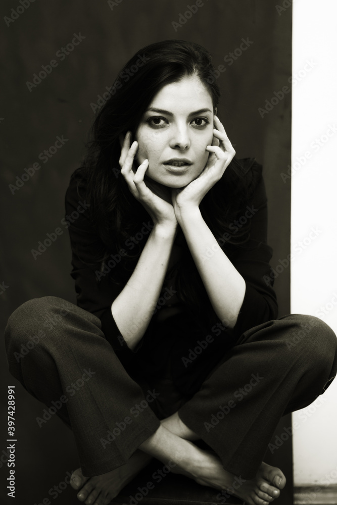 Portrait of a young happy woman isolated on a blackboard. Portrait of a young happy woman isolated on a blackboard.