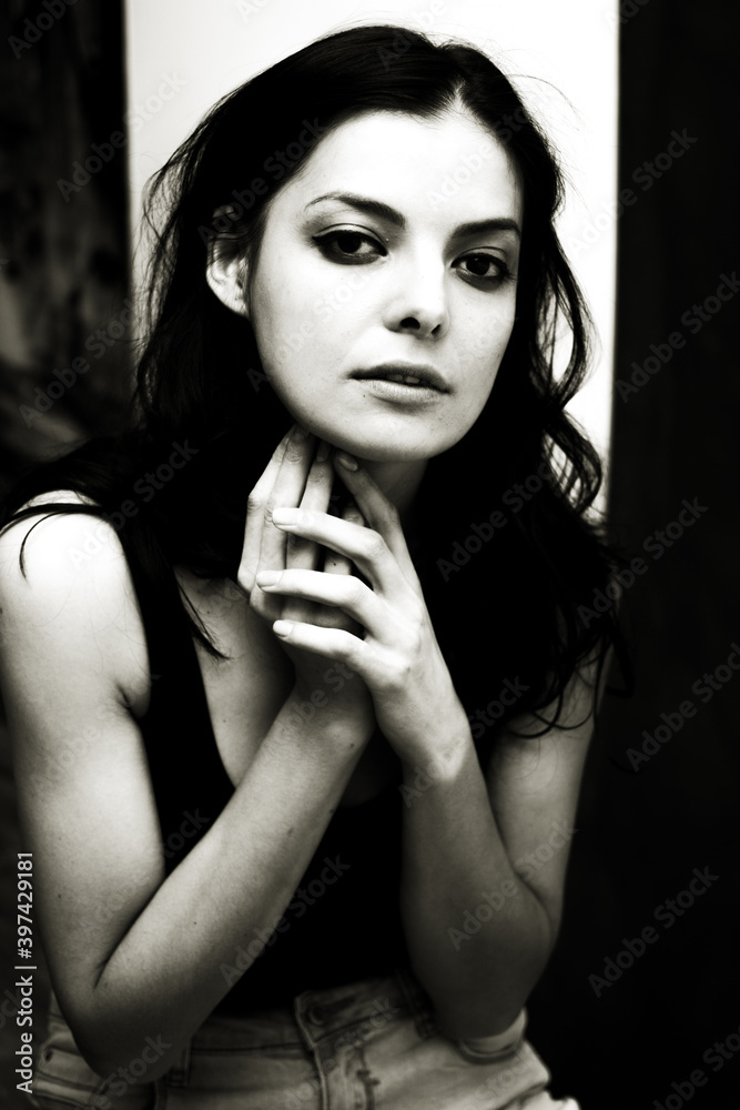Portrait of a young happy woman isolated on a blackboard. Portrait of a young happy woman isolated on a blackboard.