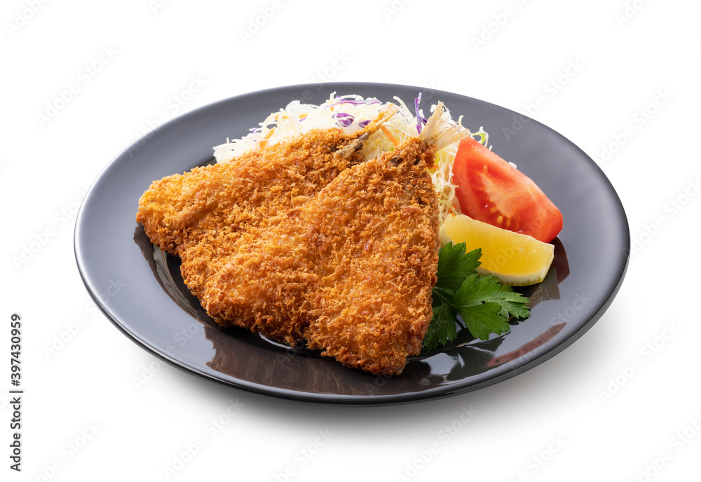 Fried horse mackerel served on a plate on a white background Fried horse mackerel served on a plate on a white background