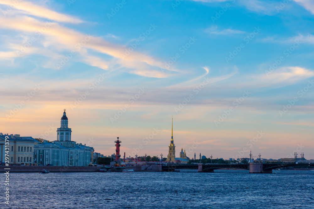 Saint Petersburg. Russia. The sky with clouds of unusual shape over the center of St. Petersburg. Vasilievsky island. Palace bridge. Kunstkammer. Petropavlovskaya fortress. Rostral column.