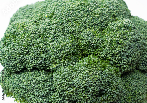 Close-up of broccoli placed on a white background