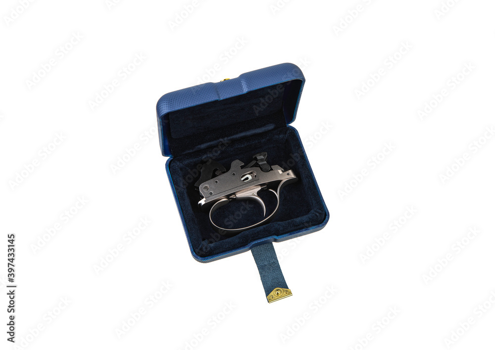 Shock trigger for shotgun isolate on white back. Gun trigger. Repair spare part. Shock trigger for shotgun isolate on white back. Gun trigger. Repair spare part.