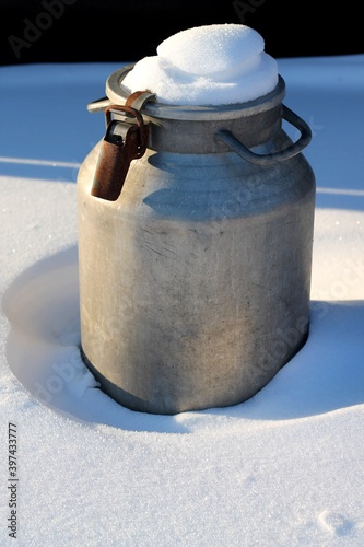 Wallpaper Mural Old iron barrel with a rusty lid, in the snow, in winter. Torontodigital.ca
