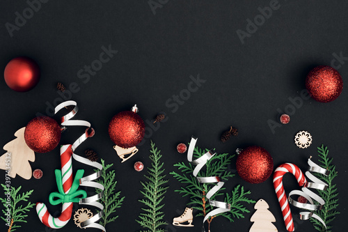 New Year s  festive decor on a black background. Copy space  flat lay  mock up  top view.