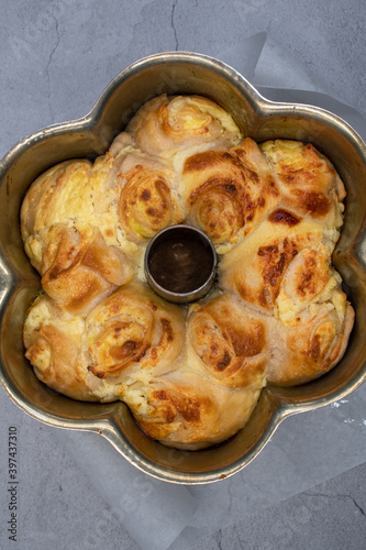 Freshly baked pull apart cheese filled bread rolls