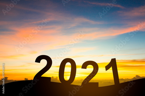 Silhouette of happy new year 2021 with beautiful twilight sky