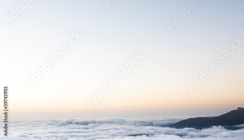 View of the clouds from the mountain. Mountain morning landscape.