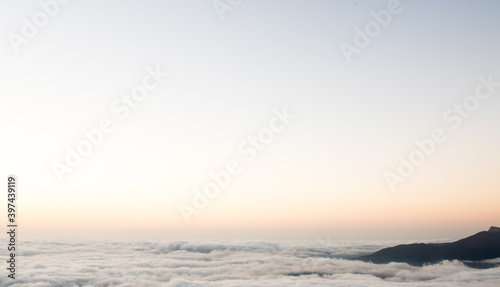View of the clouds from the mountain. Mountain morning landscape.