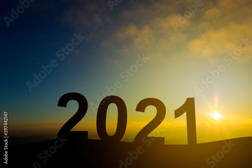 Silhouette of happy new year 2021 with beautiful twilight sky
