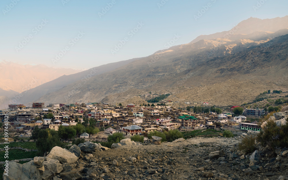 Nako village surrounded by Himalayas and rocks at sunrise. Himachal Pradesh, India.