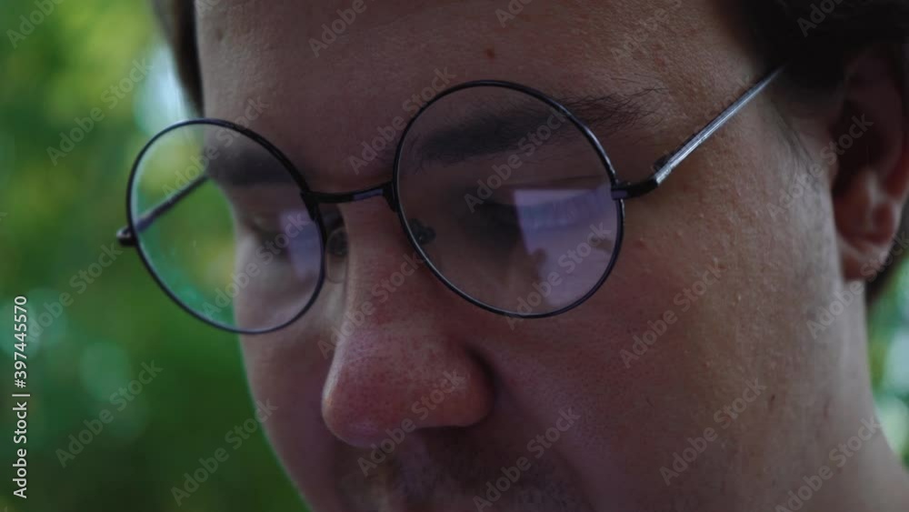 man in round glasses close up man in round glasses close up
