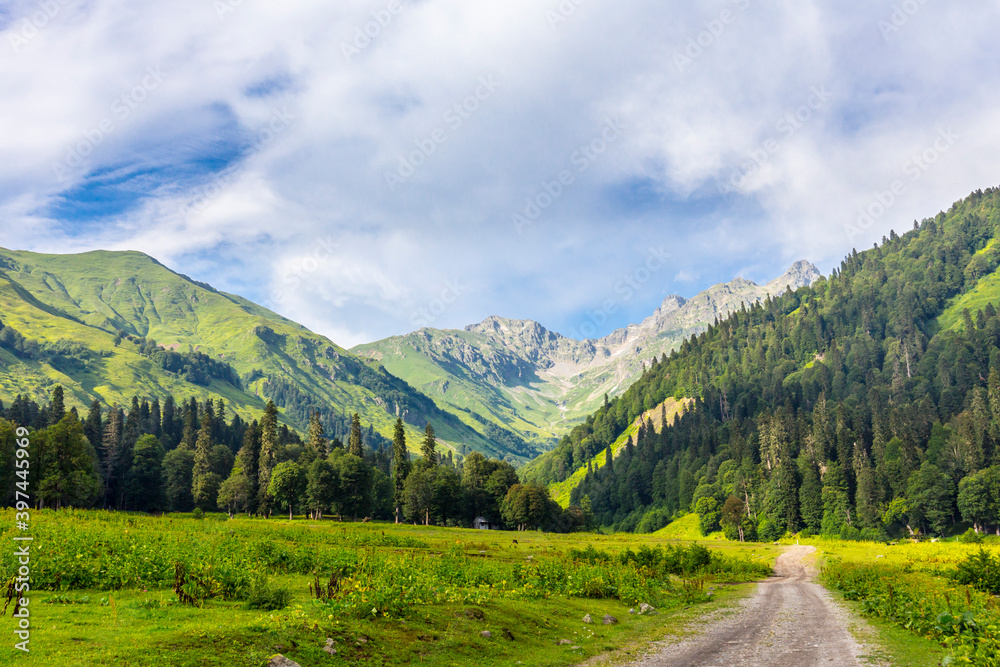 Scenery mountain landscape at Caucasus mountains with road track