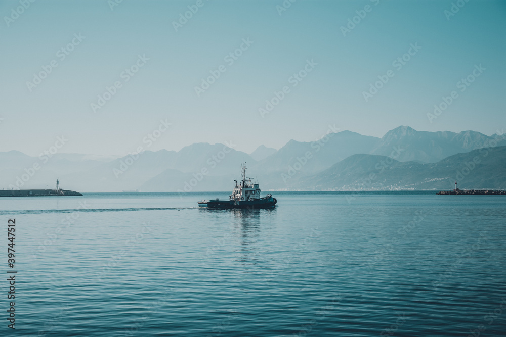 boat in the sea ready to leave the bay, Bejaia, Algeria boat in the sea ready to leave the bay, Bejaia, Algeria