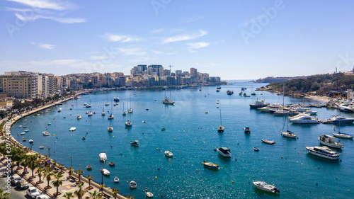 Boats moored in Marsamxett Harbour located between Sliema and Manoel Island, Gzira. photo