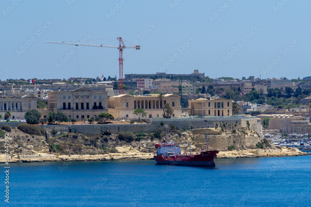 A tanker moored in front of the former Royal Naval Hospital Bighi in Kalkara, Malta.