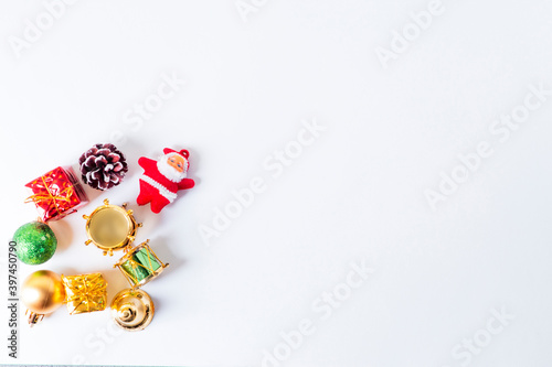 Flat lay view of Christmas decoration objects over isolated white with copy space