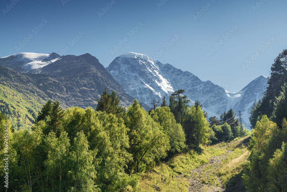 Sunny view of Cheget village near mountain Elbrus, North Caucasus, Kabardino-Balkaria, Russia.