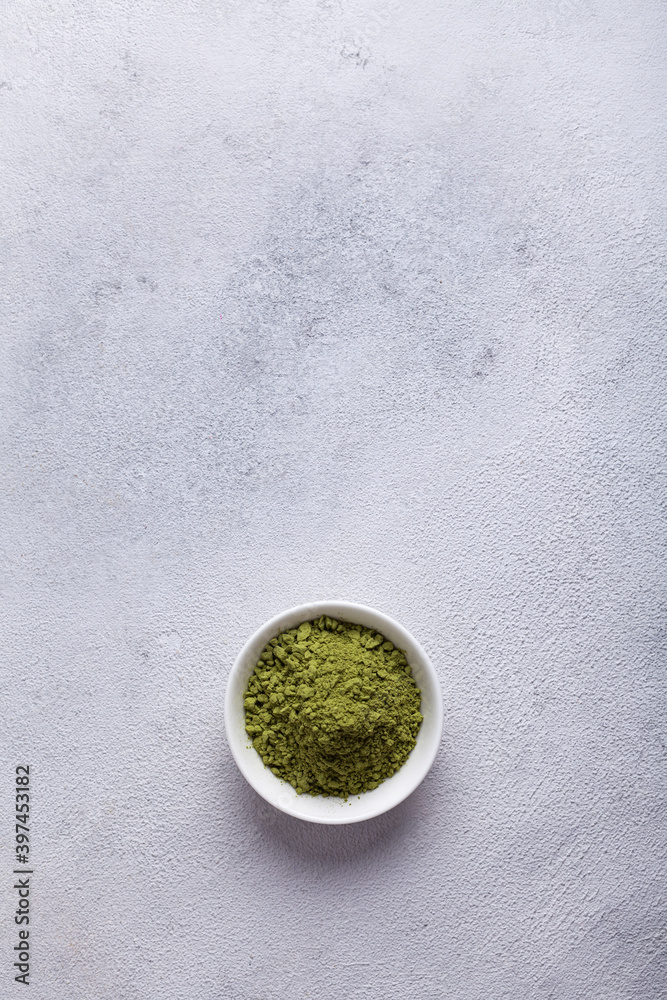 Matcha with milk in a glass on a light background Matcha with milk in a glass on a light background