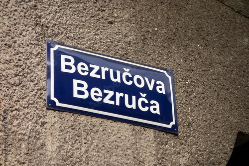 A street sign showing the text Bezrucova street in Czech and Slovak.  Petr Bezruc was one of the most important Czech poets.