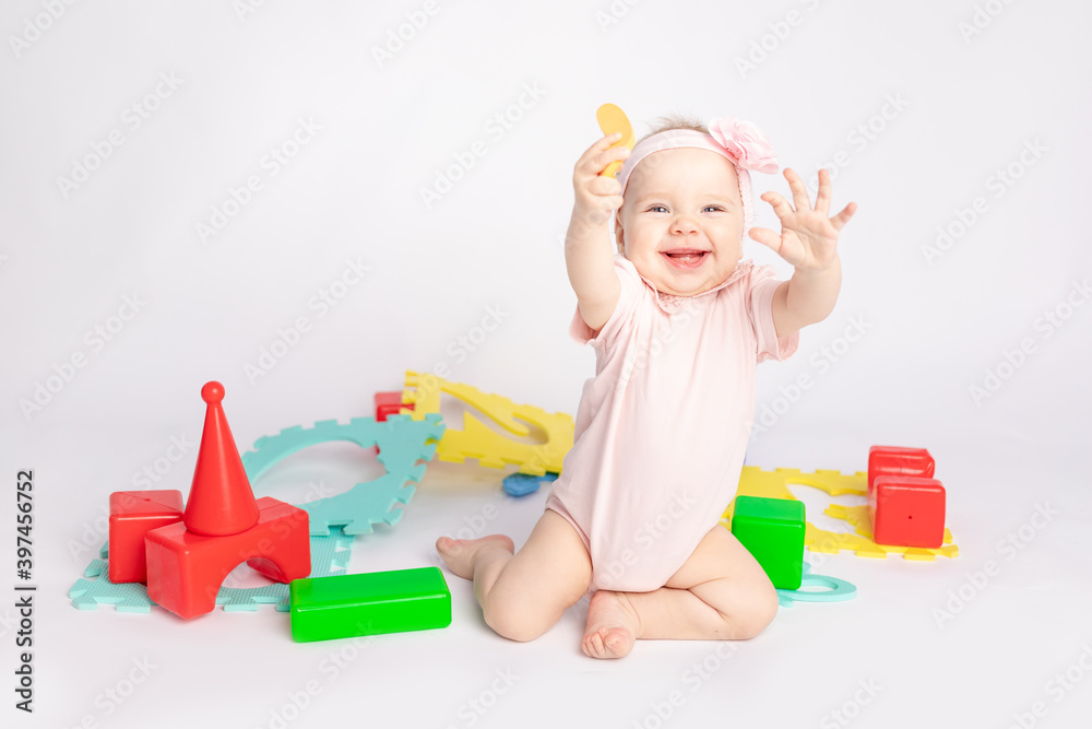 happy baby playing with cubes on white isolated background, space for text happy baby playing with cubes on white isolated background, space for text