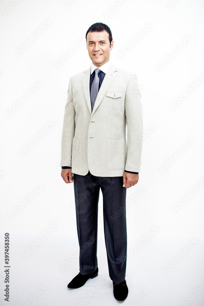 A man in a classic suit. Studio photo on a white background. Snapshot as for a catalog.