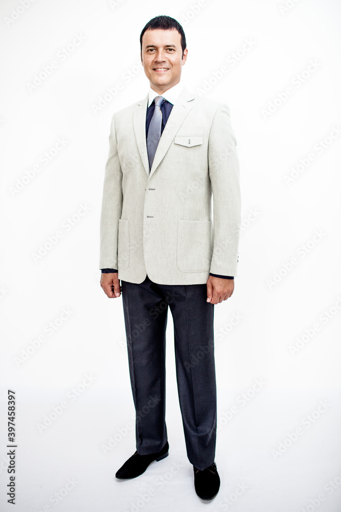 A man in a classic suit. Studio photo on a white background. Snapshot as for a catalog. A man in a classic suit. Studio photo on a white background. Snapshot as for a catalog.