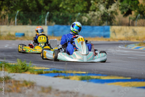 Young go cart racer on circuit