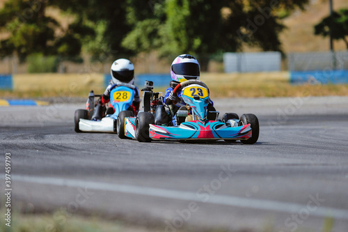 Young go cart racer on circuit