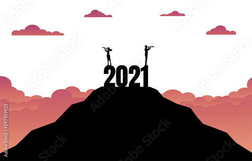 Businessman and woman with a binocular standing on the top of the mountain