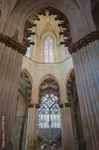 stained glass windows in the limit with tombs of kings in an ancient monastery