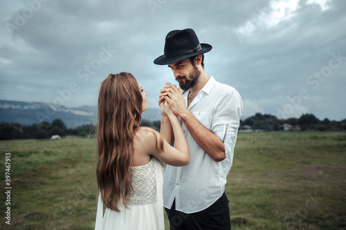Beautiful young couple. Wedding photo session outdoors in the mountains. Happy couple. New family.
