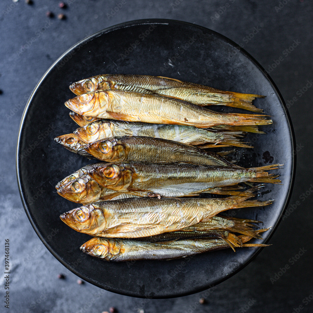 fish sardine sprats smoked or salted seafood mackerel omega-3 on the table tasty top view copy space for text food background rustic diet pescetarian fish sardine sprats smoked or salted seafood mackerel omega-3 on the table tasty top view copy space for text food background rustic diet pescetarian