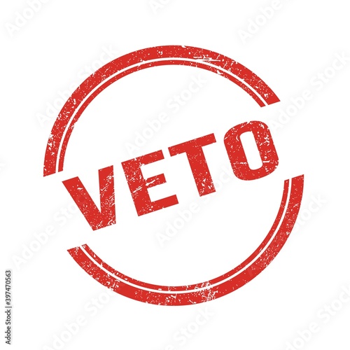 VETO text written on red grungy round stamp. photo