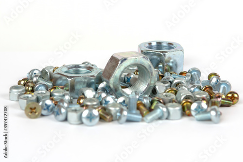 assorted bolts and nuts on a white background