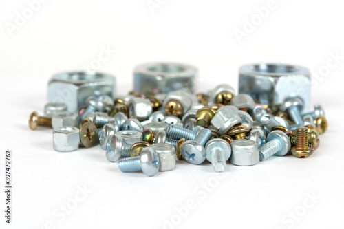 assorted bolts and nuts on a white background