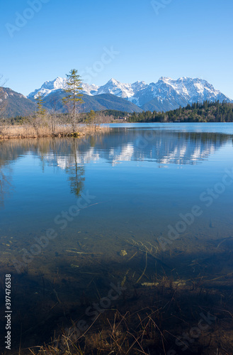 beautiful lake Barmsee  Karwendel mountains reflecting in the water. bavarian landscape
