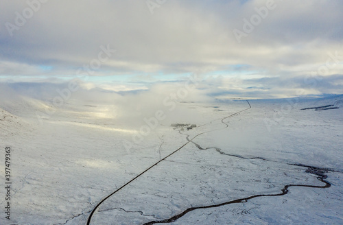 aerial view of rannoch moor in the argyll region of the highlands of Scotland in deep winter with deep snow on the ground photo