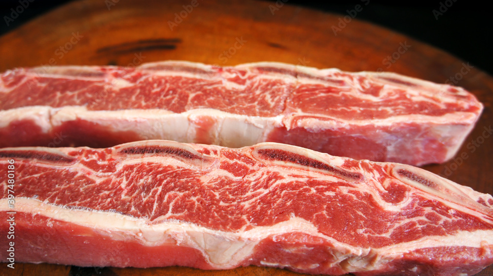 Assado de tira. Brazilian special cut of the ox rib Assado de tira. Brazilian special cut of the ox rib