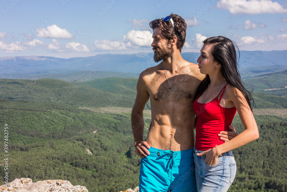 Beautiful young couple. Wedding photo session outdoors in the mountains. Happy couple. New family. Beautiful young couple. Wedding photo session outdoors in the mountains. Happy couple. New family.