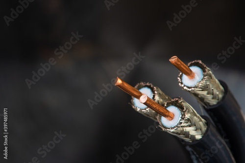Stripped coax cable closeup on dart soft background