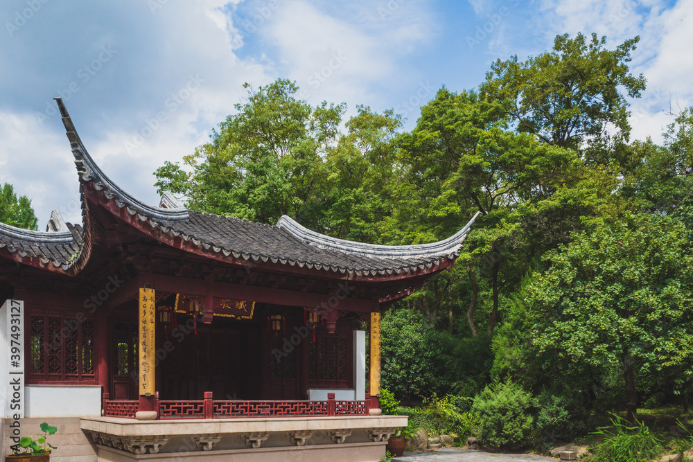 Traditional Chinese architecture among trees on Tiger Hill (Huqiu), Suzhou, Jiangsu, China Traditional Chinese architecture among trees on Tiger Hill (Huqiu), Suzhou, Jiangsu, China
