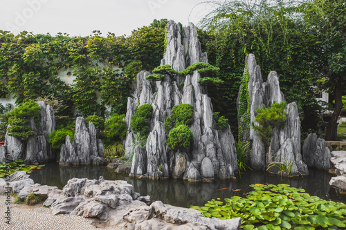 Giant rock in pond at Lingering Garden Scenic Area, Suzhou, Jiangsu, China