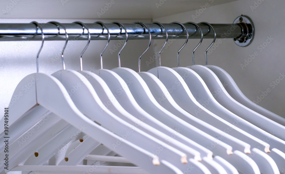 Fototapeta premium Clothes hangers inside the closet