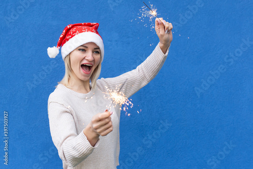 Beautiful girl on a blue background, New Year