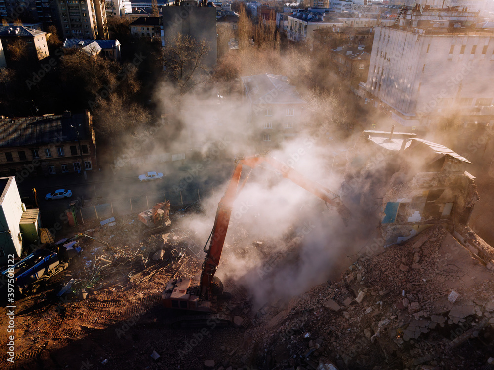 Aerial view of demolition site. Process of demolition of old industrial building