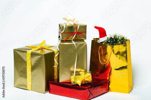 Boxes of Christmas gifts. Merry Christmas gift box with bows for greeting card. Decoration and copy space for your text. Happy New Year 2021 winter merry handmade holiday present composition.